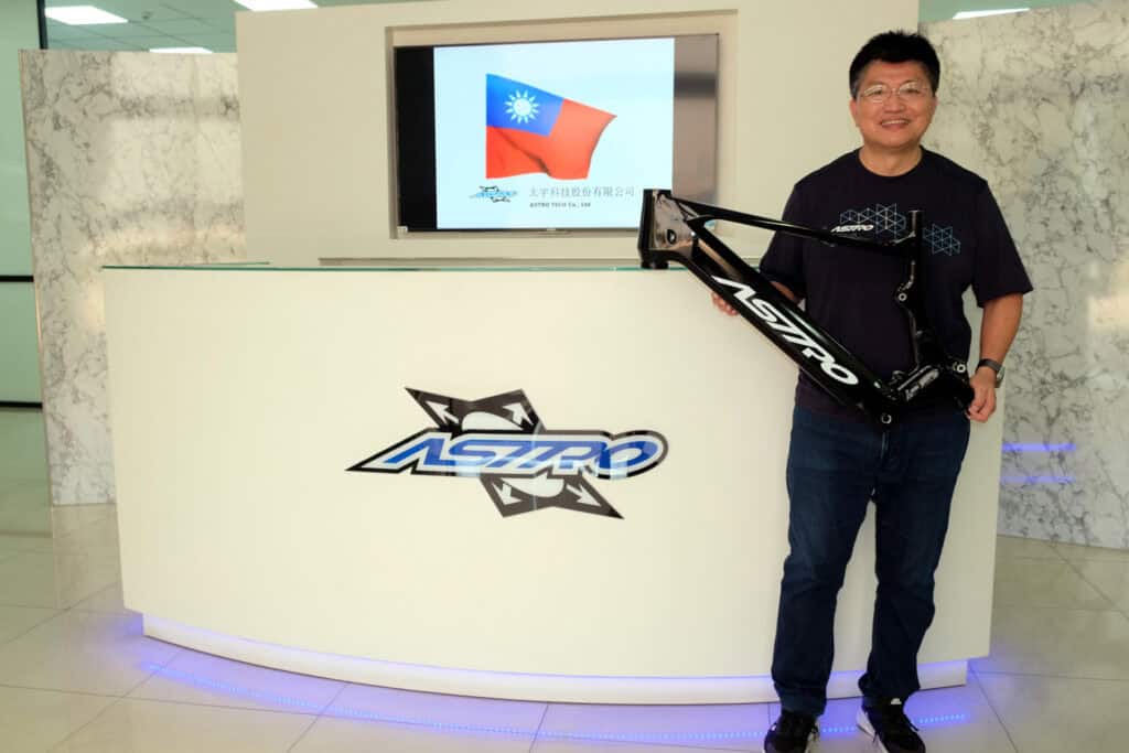 Astro Tech’s founder Samuel Hu shows the latest generation of alloy e-mountainbike frame in the company’s lobby.